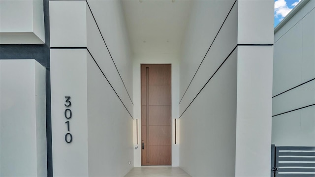 staircase with a towering ceiling