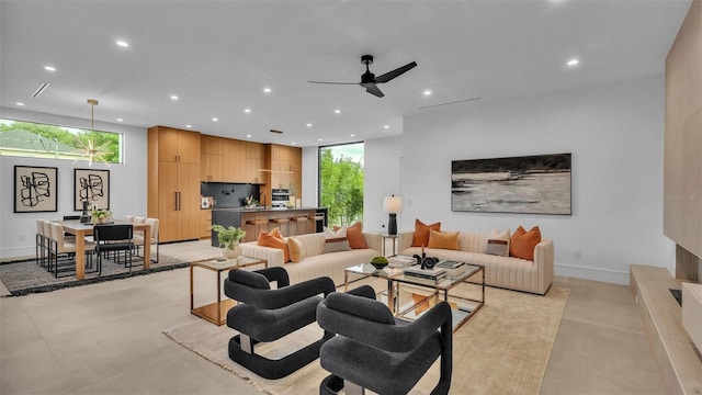 living room featuring ceiling fan