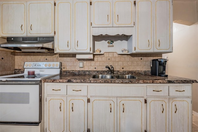 kitchen featuring decorative backsplash, sink, electric range, and light brown cabinetry