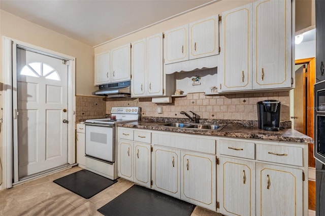 kitchen with light tile patterned floors, sink, backsplash, and white range with electric stovetop