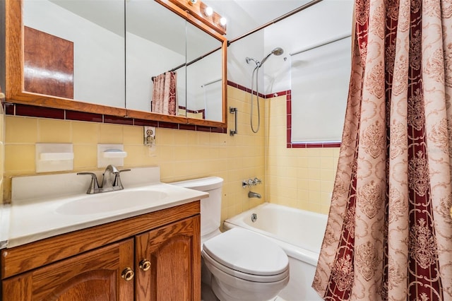 full bathroom featuring toilet, decorative backsplash, shower / bath combination with curtain, tile walls, and vanity