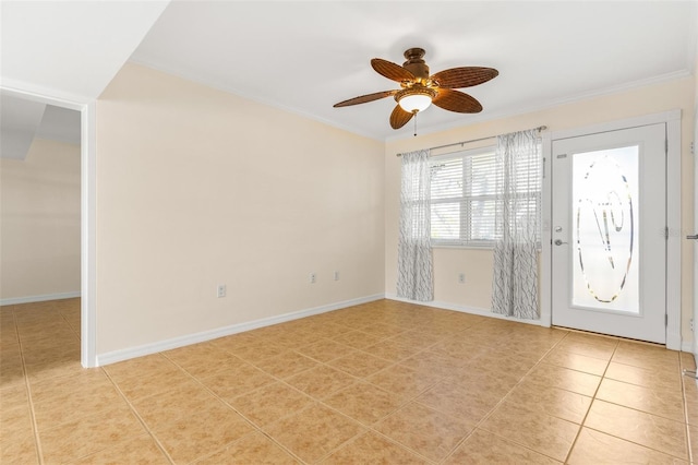 tiled foyer featuring ceiling fan and ornamental molding