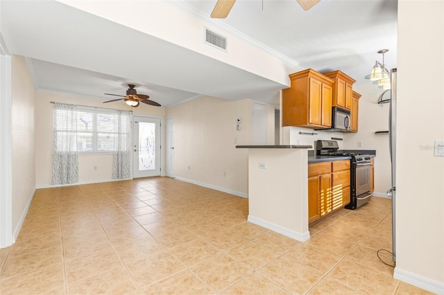 kitchen featuring ceiling fan, appliances with stainless steel finishes, crown molding, and light tile patterned flooring