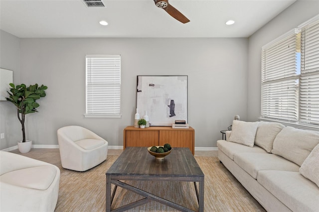 living room with ceiling fan