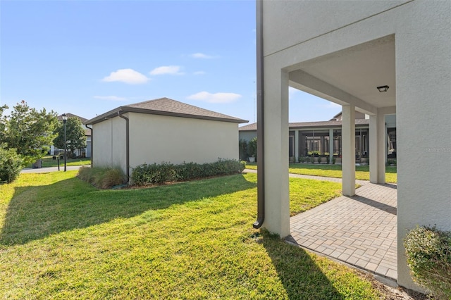 view of home's exterior featuring a yard