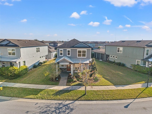 view of front of property featuring a front lawn