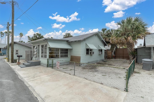 view of front of property with cooling unit