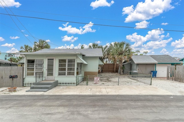 single story home featuring a garage