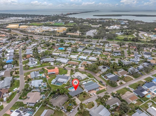 drone / aerial view with a water view