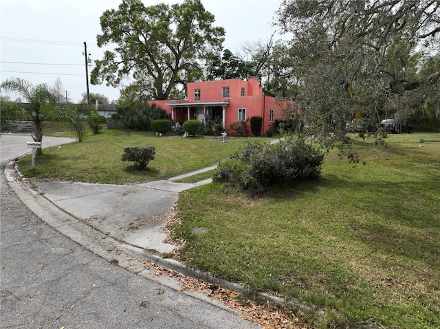 view of front of property with a front lawn