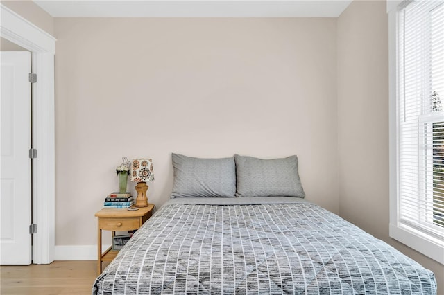 bedroom featuring wood-type flooring