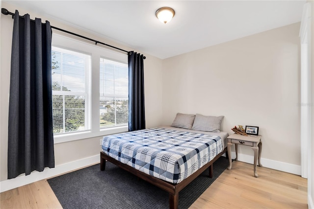 bedroom featuring light hardwood / wood-style floors