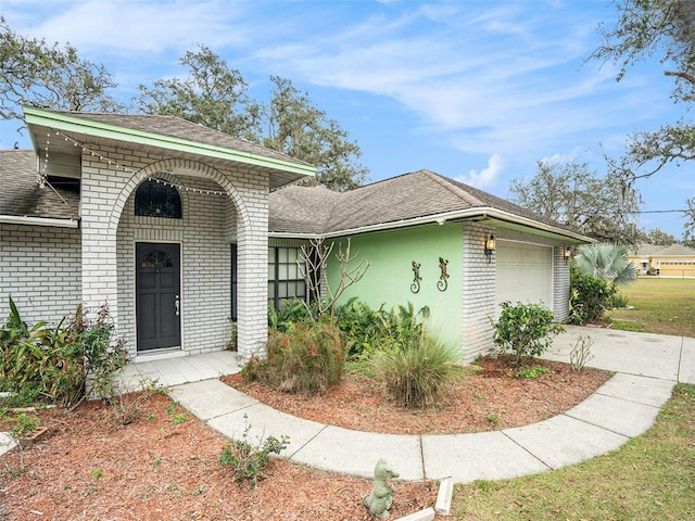 view of front of home with a garage