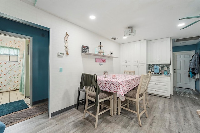 dining area featuring light hardwood / wood-style flooring