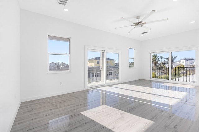 unfurnished room with ceiling fan