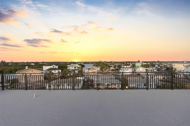 view of patio terrace at dusk