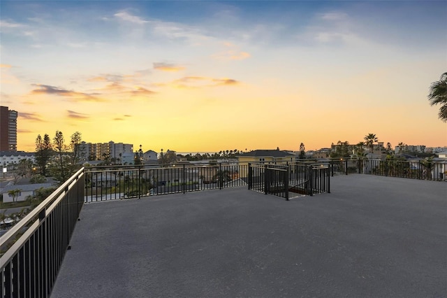 view of patio terrace at dusk