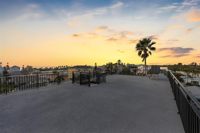 view of patio terrace at dusk