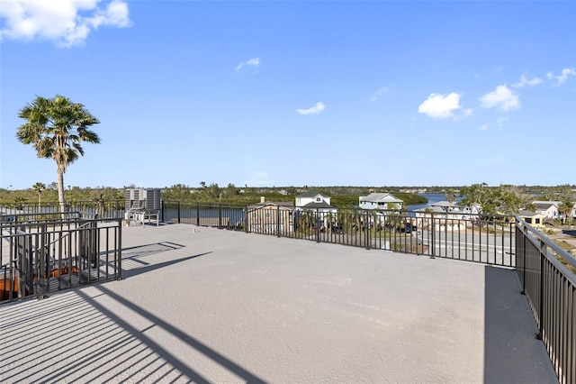 view of patio featuring a water view