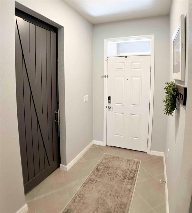 view of tiled foyer entrance