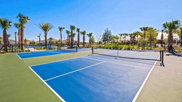 view of sport court featuring basketball hoop