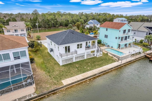 drone / aerial view featuring a water view