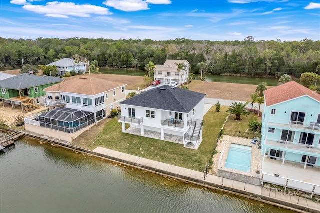 bird's eye view with a water view