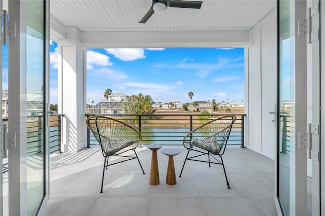 balcony featuring ceiling fan