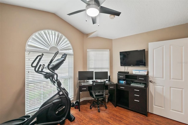 office with ceiling fan, hardwood / wood-style floors, and lofted ceiling