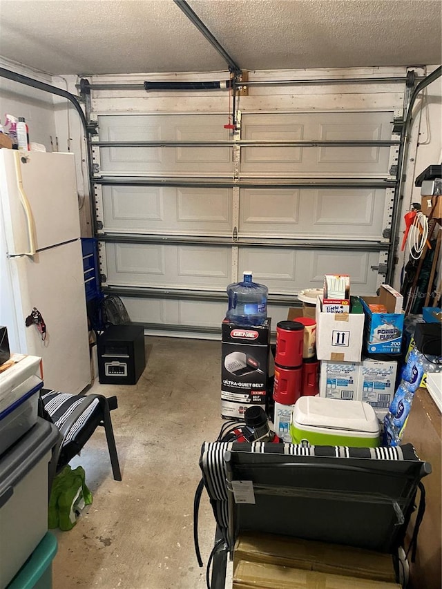 garage with white refrigerator