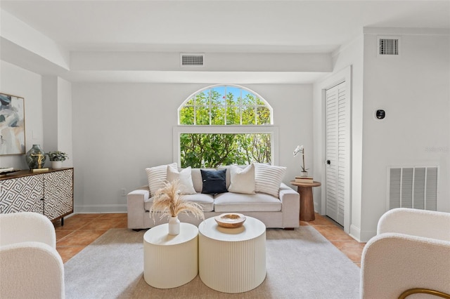 living room featuring light tile patterned flooring