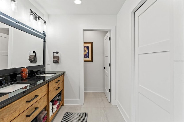 bathroom featuring vanity and tile patterned floors