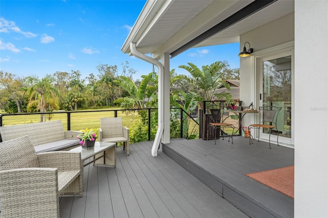 deck with an outdoor hangout area