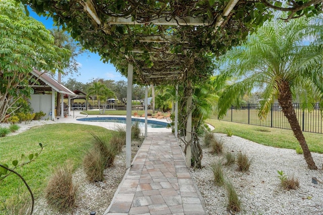 exterior space featuring a lawn and a patio area