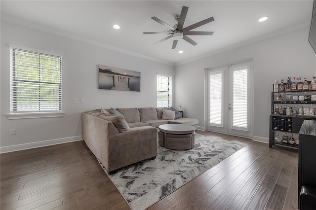 living room featuring ornamental molding, ceiling fan, french doors, and dark hardwood / wood-style flooring