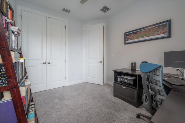 home office with carpet floors