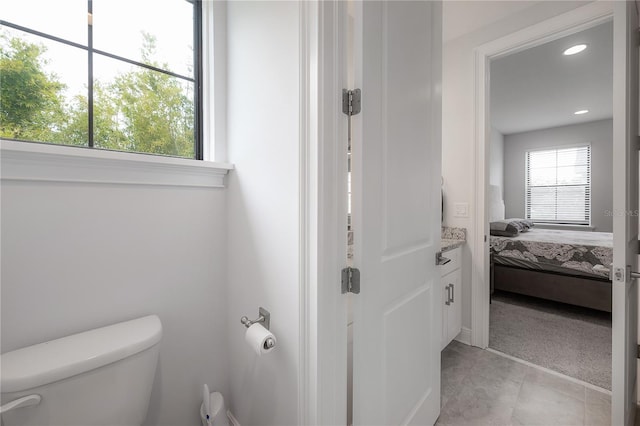 bathroom featuring tile patterned floors and toilet