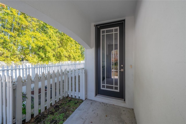 property entrance with a balcony