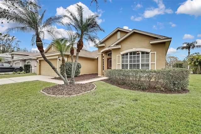 view of front of property featuring a garage and a front lawn