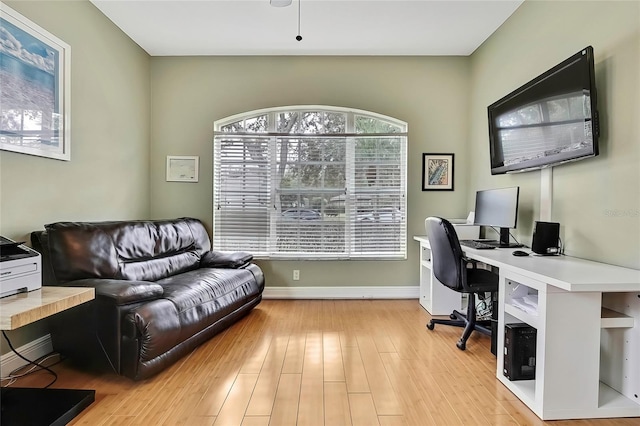 office area with light hardwood / wood-style flooring