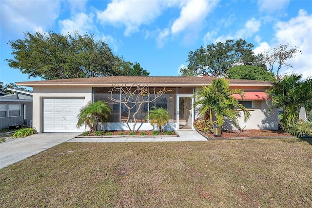 single story home with a front yard, a garage, and a sunroom