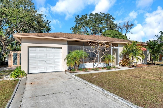 ranch-style house with a front yard and a garage