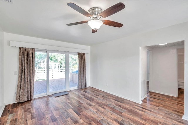 unfurnished room with ceiling fan and wood-type flooring