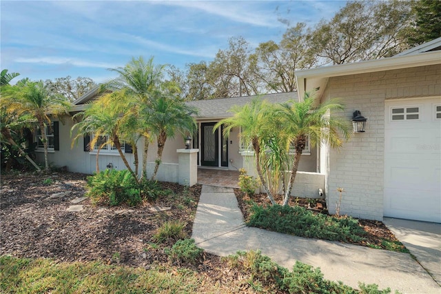 property entrance featuring a garage