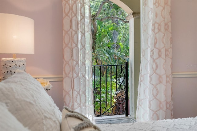 entrance to property featuring a balcony