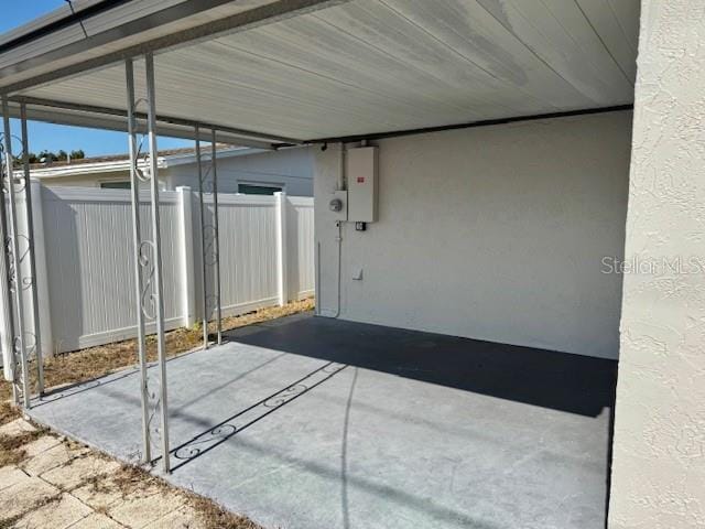 view of patio with electric panel