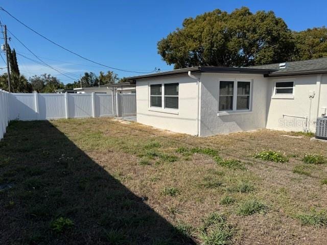 view of home's exterior with a lawn