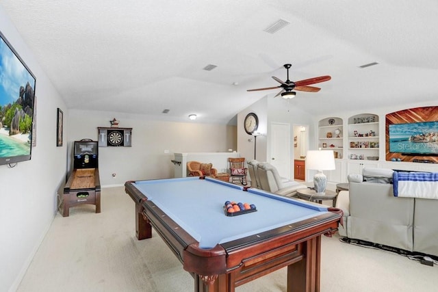 rec room featuring ceiling fan, vaulted ceiling, pool table, a textured ceiling, and built in shelves