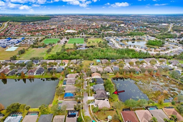 bird's eye view with a water view