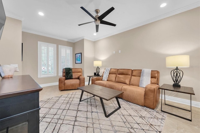 living room featuring ceiling fan and crown molding